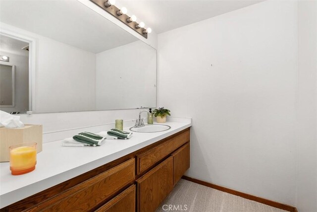 31531 Via Conejo Unit 153, Coto De Caza, CA 92679 - bathroom with vanity and baseboards