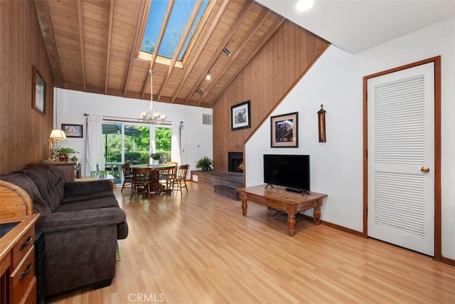 31531 Via Conejo Unit 153, Coto De Caza, CA 92679 - living room with wooden ceiling, a chandelier, high vaulted ceiling, light wood-type flooring, and baseboards