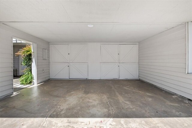 31531 Via Conejo Unit 153, Coto De Caza, CA 92679 - garage featuring wood walls