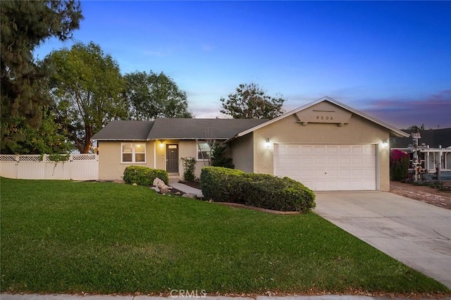 8506 Conway Dr, Riverside, CA 92504 - ranch-style home with an attached garage, concrete driveway, and stucco siding