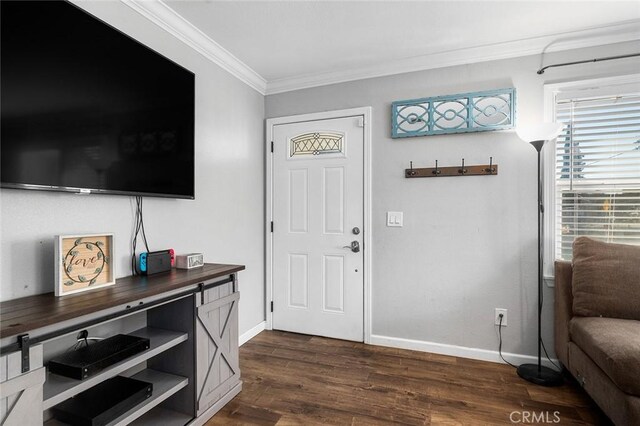8506 Conway Dr, Riverside, CA 92504 - entryway with ornamental molding, baseboards, and dark wood-style floors