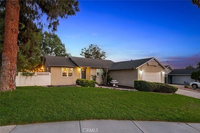 8506 Conway Dr, Riverside, CA 92504 - single story home with a garage, stucco siding, and driveway