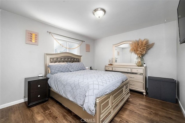 8506 Conway Dr, Riverside, CA 92504 - bedroom with dark wood-style flooring and baseboards