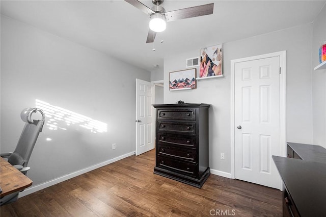 8506 Conway Dr, Riverside, CA 92504 - bedroom with dark wood-style flooring, baseboards, a ceiling fan, and an office area