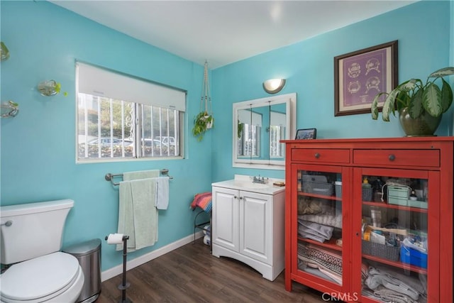 471 N Ditman Ave, Los Angeles, CA 90063 - bathroom featuring vanity, wood finished floors, toilet, and baseboards