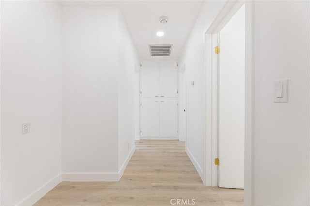 3411 N Pershing Ave, San Bernardino, CA 92405 - hall featuring light wood-style flooring, baseboards, and recessed lighting