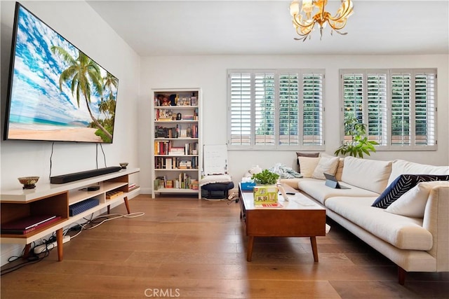 241 S Reeves Dr Unit 302, Beverly Hills, CA 90212 - living room featuring wood finished floors and a chandelier