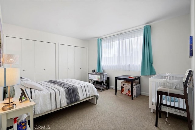 241 S Reeves Dr Unit 302, Beverly Hills, CA 90212 - bedroom featuring two closets and carpet