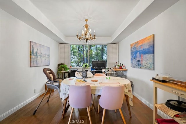 241 S Reeves Dr Unit 302, Beverly Hills, CA 90212 - dining room featuring wood finished floors, a chandelier, and a tray ceiling
