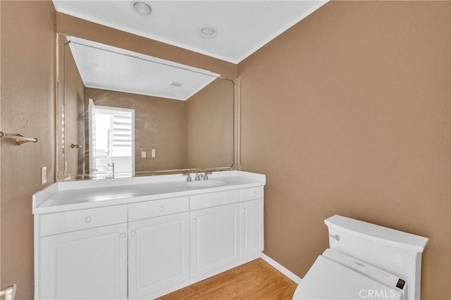 6325 Ridgepath Ct, Rancho Palos Verdes, CA 90275 - bathroom featuring toilet, vanity, wood finished floors, and baseboards
