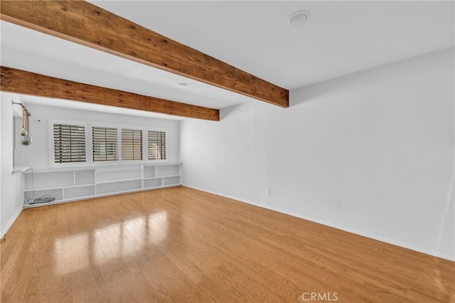 6325 Ridgepath Ct, Rancho Palos Verdes, CA 90275 - empty room featuring wood finished floors, beam ceiling, and baseboards