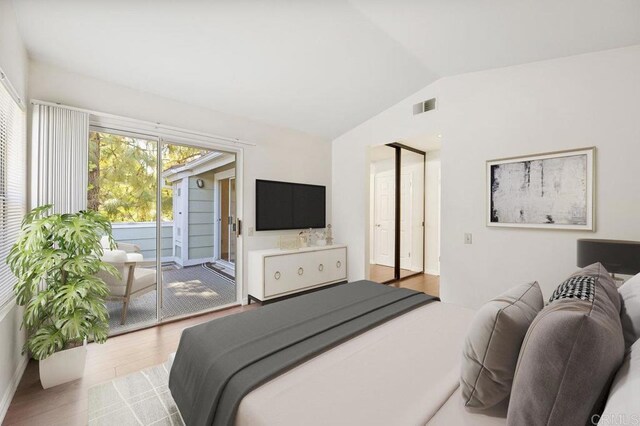 13398 Tiverton Rd, San Diego, CA 92130 - bedroom featuring access to outside, lofted ceiling, and wood finished floors