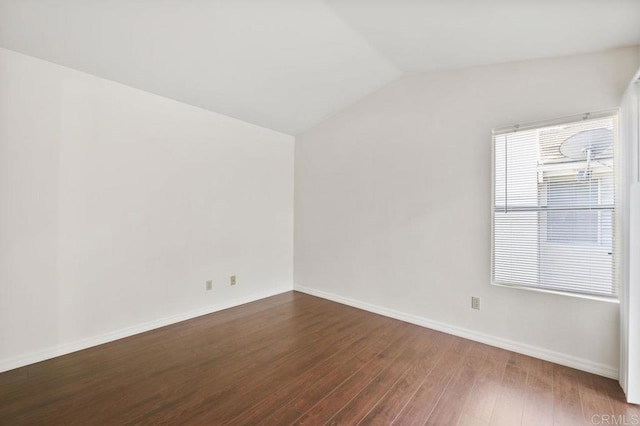 13398 Tiverton Rd, San Diego, CA 92130 - empty room with lofted ceiling, wood finished floors, and baseboards