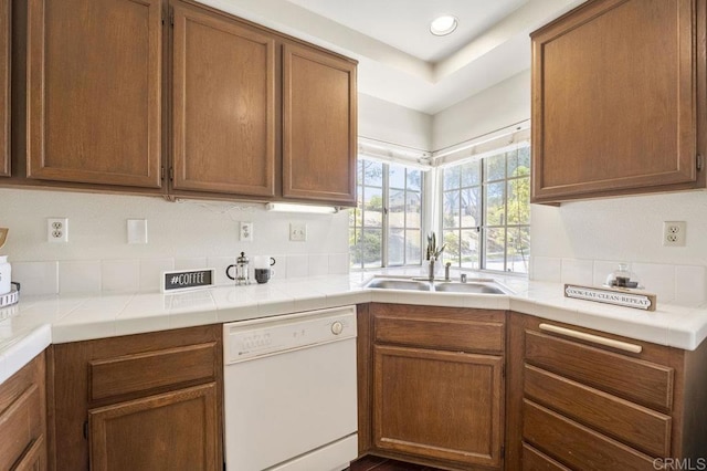 13398 Tiverton Rd, San Diego, CA 92130 - kitchen with dishwasher, a sink, recessed lighting, and brown cabinets