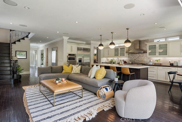 178 Flower St, Costa Mesa, CA 92627 - living area with ornamental molding, stairway, dark wood finished floors, and recessed lighting