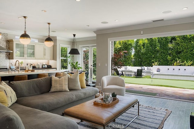 178 Flower St, Costa Mesa, CA 92627 - living room featuring wood finished floors and recessed lighting
