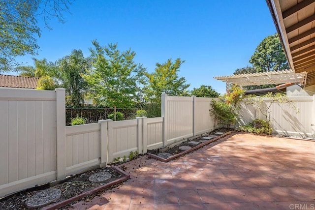 1640 Forestdale Dr, Encinitas, CA 92024 - fenced backyard with a patio and a pergola