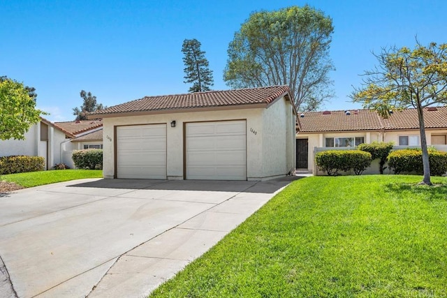 1640 Forestdale Dr, Encinitas, CA 92024 - mediterranean / spanish-style home featuring a tile roof, stucco siding, and a front yard