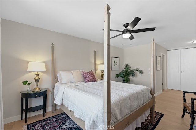 10707 Camarillo St Unit 314, North Hollywood, CA 91602 - bedroom with light wood-type flooring, a ceiling fan, baseboards, and a closet