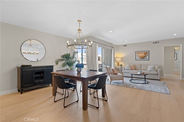 10707 Camarillo St Unit 314, North Hollywood, CA 91602 - dining area with a chandelier, light wood-style floors, recessed lighting, and baseboards