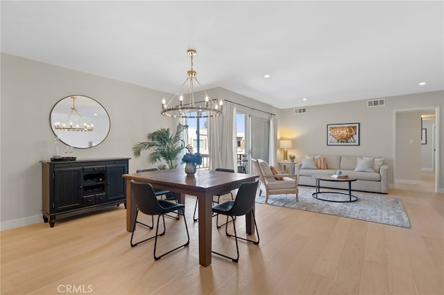 10707 Camarillo St Unit 314, North Hollywood, CA 91602 - dining area featuring a chandelier, light wood-style flooring, recessed lighting, and baseboards