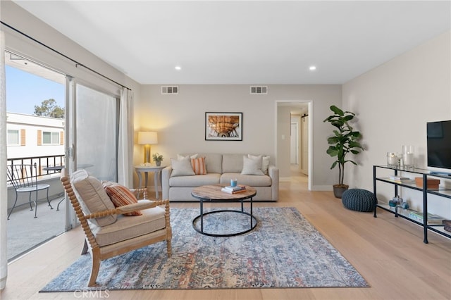 10707 Camarillo St Unit 314, North Hollywood, CA 91602 - living room featuring light wood-style floors, recessed lighting, and baseboards