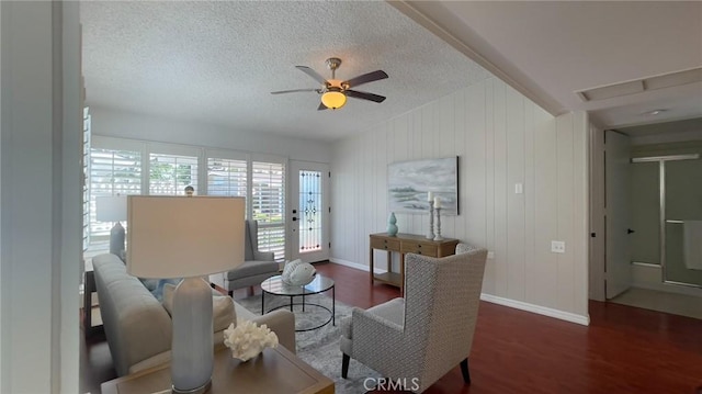 13800 Annandale Dr Unit 37A, Seal Beach, CA 90740 - living area featuring wood finished floors, a ceiling fan, a textured ceiling, baseboards, and vaulted ceiling