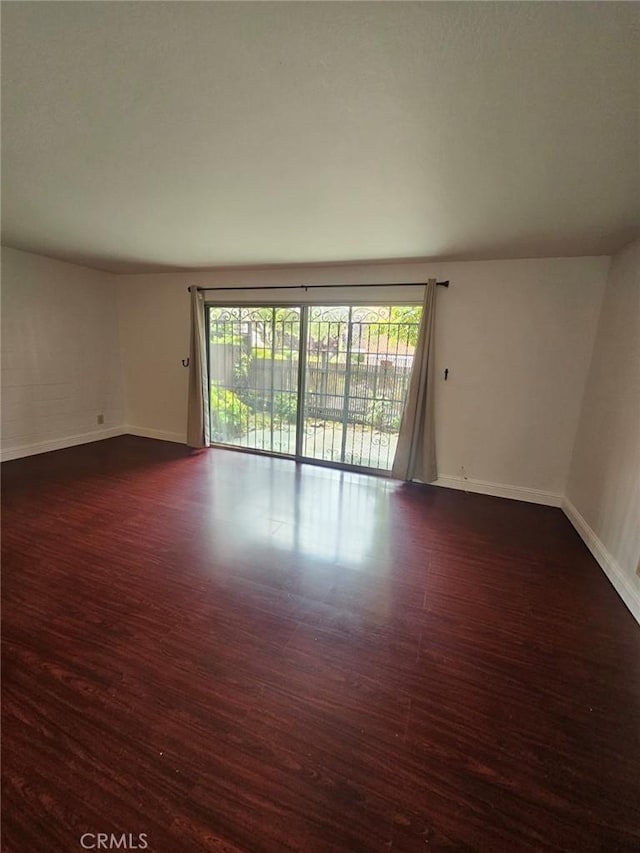 75 Western Shore Ln Unit 1, San Francisco, CA 94115 - spare room with dark wood finished floors and baseboards