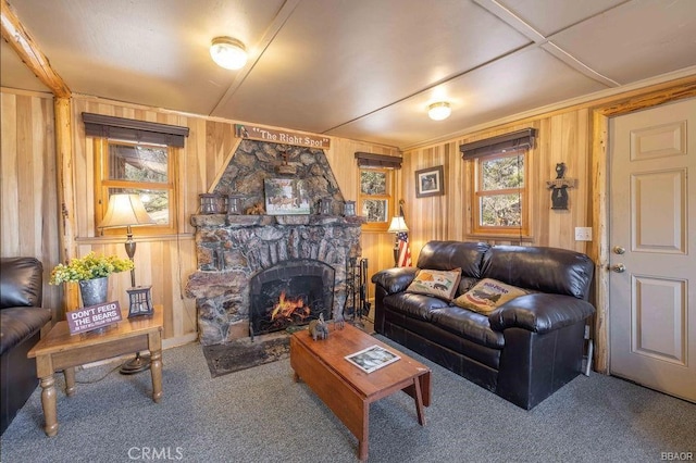 75 Metcalf Creek Trl, Big Bear Lake, CA 92315 - living room with carpet floors, a stone fireplace, and wood walls