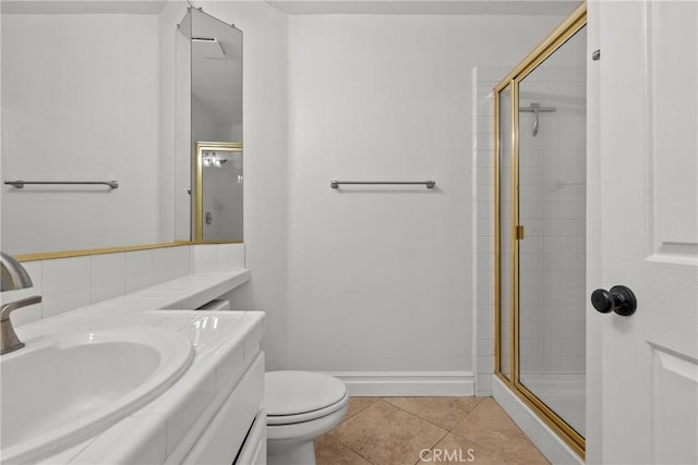 27360 Chesterfield Dr, Valencia, CA 91354 - bathroom with vanity, a shower stall, tile patterned floors, toilet, and baseboards