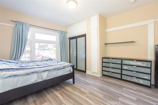 2712 Kenwood Ave, Los Angeles, CA 90007 - bedroom with wood finished floors and baseboards