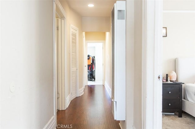 2712 Kenwood Ave, Los Angeles, CA 90007 - corridor with a heating unit, baseboards, wood finished floors, and recessed lighting