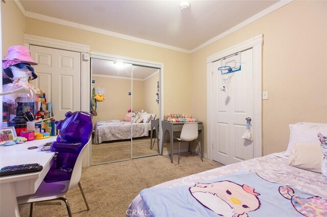 2712 Kenwood Ave, Los Angeles, CA 90007 - bedroom featuring carpet flooring, ornamental molding, and a closet