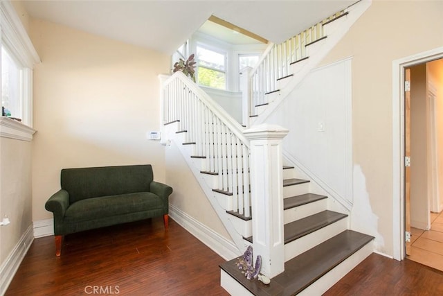 2712 Kenwood Ave, Los Angeles, CA 90007 - stairs featuring wood finished floors and baseboards