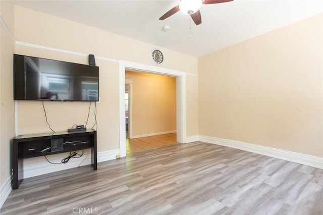 2712 Kenwood Ave, Los Angeles, CA 90007 - living area with a ceiling fan, wood finished floors, and baseboards