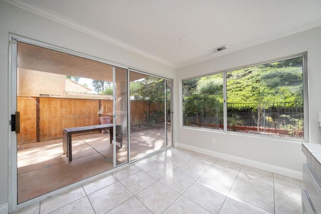 1688 Crystal Ridge Ct, Vista, CA 92081 - unfurnished sunroom featuring crown molding, healthy amount of natural light, tile patterned flooring, and baseboards