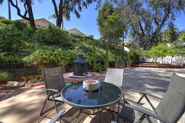 1688 Crystal Ridge Ct, Vista, CA 92081 - fenced backyard featuring a patio and outdoor dining area