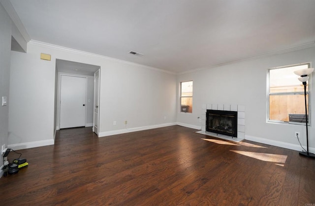 1688 Crystal Ridge Ct, Vista, CA 92081 - unfurnished living room featuring a tiled fireplace, ornamental molding, baseboards, and wood finished floors