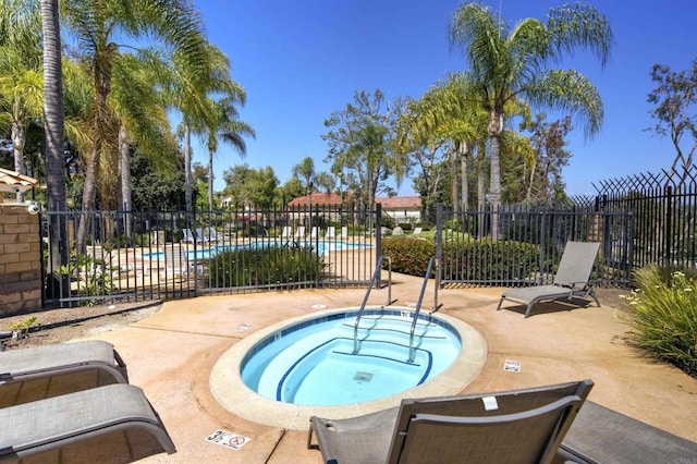 1688 Crystal Ridge Ct, Vista, CA 92081 - view of pool featuring a hot tub and a patio