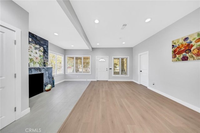 404 E Kingsley Ave, Pomona, CA 91767 - unfurnished living room featuring a fireplace, wood finished floors, baseboards, and recessed lighting