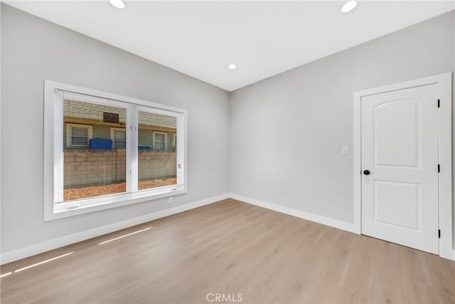 404 E Kingsley Ave, Pomona, CA 91767 - spare room with light wood-type flooring, baseboards, and recessed lighting