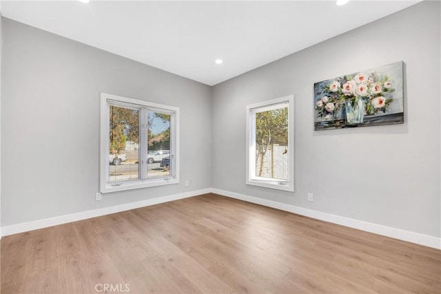 404 E Kingsley Ave, Pomona, CA 91767 - spare room featuring baseboards, wood finished floors, and recessed lighting