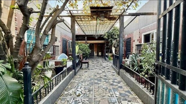 2949 S Harcourt Ave, Los Angeles, CA 90016 - view of patio / terrace featuring a pergola