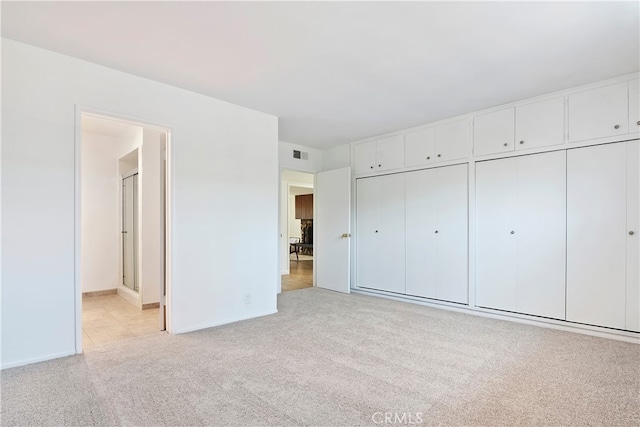 4312 Babcock Ave Unit 6, Studio City, CA 91604 - unfurnished bedroom with light carpet, baseboards, and ensuite bathroom