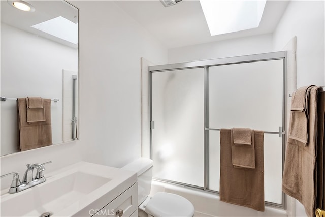 4312 Babcock Ave Unit 6, Studio City, CA 91604 - full bathroom featuring a skylight, vanity, shower / bath combination with glass door, and toilet