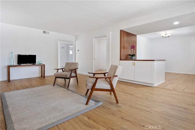 4312 Babcock Ave Unit 6, Studio City, CA 91604 - sitting room featuring light wood-type flooring, a chandelier, recessed lighting, and baseboards