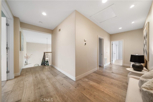 3048 Street Of The Chimes, Chino Hills, CA 91709 - living room with light wood finished floors, recessed lighting, and attic access
