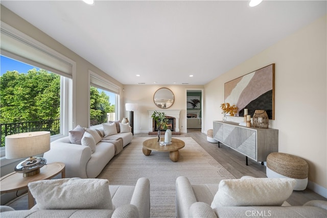 3048 Street Of The Chimes, Chino Hills, CA 91709 - living room featuring recessed lighting, wood finished floors, and a glass covered fireplace