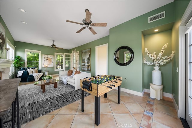 3048 Street Of The Chimes, Chino Hills, CA 91709 - rec room with ceiling fan, light tile patterned floors, and a fireplace