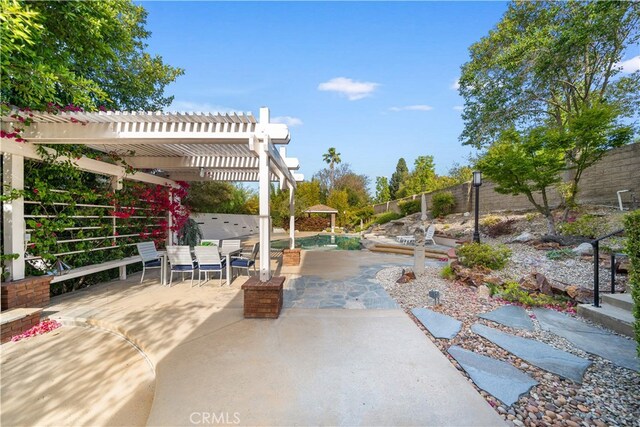 3048 Street Of The Chimes, Chino Hills, CA 91709 - fenced backyard with a pergola, outdoor dining area, and a patio area